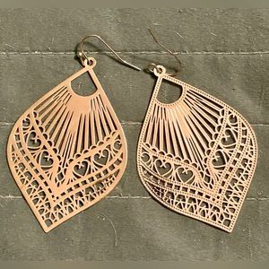 Intricate silver light weight big statement earrings